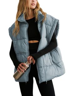 PRICES MAY VARY. Material: classic versatile puffy vest for women, lightweight warm black sleeveless padded gilet, made of soft, skin-friendly high quality polyester fabric, comfy to wear, keeping you warm during chilly days Features: womens full zip thick quality padded vest, adjustable drawstring waistband, stand collar, two side pockets, slight exaggerated shoulders, solid color, oversized style with a slouchy fit, stylish basic sleeveless padded coat allows most types of bodyshape Matching: Oversized Puffer Vest, Winter Puffer Vest, Oversized Puffer Jacket, Fall Vest, Oversized Puffer, Womens Puffer Vest, Black Puffer Vest, Quilted Puffer Vest, Winter Vest