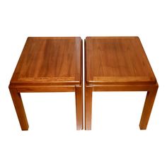 two wooden tables sitting next to each other on a white background with no one in the photo