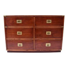 a wooden dresser with brass handles and drawers