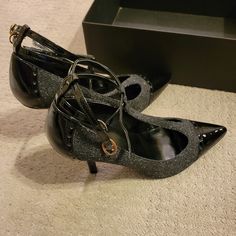 Tahari Brianna Leather T-Strap Heels. New Black-White And Black In Color With Double Adjustable Straps. Patent Leather Pointed Toes, Back, And Heel. Comes In The Original Box. Never Worn. Size 8.5. 3-3.5 Inch Heel. Black T-strap Heels For Night Out, Gray Closed Toe Heels For Party, Black T-strap Heels With Heel Strap, Gray Pointed Toe Party Heels, Gray Pointed Toe Heels For Party, Gray Ankle Strap Heels For Party, Gray Ankle Strap Heels For Evening, Chic Gray Ankle Strap Heels, T Strap Heels