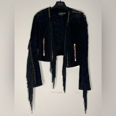 Balmain Cropped Fringe Trim Suede Moto Jacket In Black Lambskin. Gold-Tone Metal Eyelets Embellishment. Made In Turkey. Size: Fr 34 100% Lambskin. Condition: Very Good. Details: Lightly Used With Minor Signs Of Use And Marks At Trim. Designer Leather Jacket For Evening In Fall, Elegant Long Sleeve Biker Jacket For Evening, Designer Leather Jacket For Night Out, Designer Long Sleeve Leather Jacket For Night Out, Designer Long Sleeve Leather Jacket For Parties, Designer Leather Jacket For Party, Luxury Long Sleeve Leather Jacket For Party, Fitted Long Sleeve Biker Jacket For Evening, Luxury Biker Jacket For Fall Parties