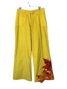 Yantha Yellow Womens corduroy Hippie Pants Wide Leg L Embroidered Bohemian NWT This cute yellow pant is the best thing to add to your wordrobe. Hard to find happy yellow color will definitely add some color to your wardrobe. Fully lined, It has two front hidden pockets in the front. Wide leg comfortable casual yet can be dressy hippy style pant, Waist 31" Hips 44" Leg cuff wide 13" inseam 31" Rise 11.5" Hippie Style Cotton Pants For Fall, Embroidered Cotton Bottoms For Fall, Yellow Embroidered Cotton Bottoms, Embroidered Yellow Cotton Bottoms, Yellow Cotton Bottoms For Fall, Mustard Cotton Pants For Fall, Yellow Cotton Bohemian Pants, Yellow Bohemian Cotton Pants, Yellow Cotton Fall Pants