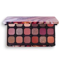 Look and feel flawless with the Forever Flawless Allure Palette. With 18 matte, shimmer and marbled pressed glitter eyeshadows, you’ll be spoilt for choice! With an array of neutrals, warm rust hues and deep glossy berries it’s the perfect palette to create a rich smoky eye. Use soft nude sensation as a base across the lid, blend in risky and suave shades with an eyeshadow brush and deepen along the eye socket with plum nymph. Add highlights of the two-tone glitter shades in flaunt and sinner an Eyeshadow Palette Revolution, Revolution Pallete, Eyeshadow Names, Makeup Revolution Forever Flawless, Makeup Revolution Palette, Revolution Beauty, Revolution Eyeshadow, Make Up Forever, Makeup Eyeshadow Palette