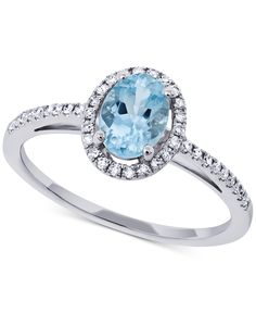 A gorgeous aquamarine centerpiece is exquisitely framed by a glowing halo of diamonds to create this unique and elegant white gold ring. Silver And Gold Rings, Sterling Silver Jewelry Rings, Aquamarine Jewelry, Titanium Rings, White Gold Jewelry, White Gold Ring, Sea Glass Jewelry, Diamond Bracelets, 925 Sterling Silver Jewelry