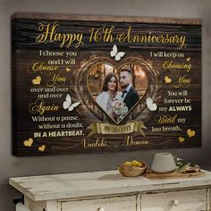 a wooden plaque with the words happy 10th anniversary and two hearts in gold on it