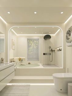 a white bathroom with a tub, sink and toilet in it's center area