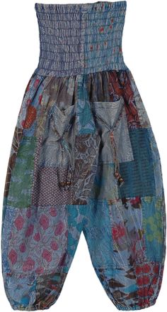 A stonewashed harem style patchwork pants in a blue tone and various fascinating prints. These soft cotton pull-on pants feature a smocking elastic waist, two functional front pockets with wooden-bead-closing buttons and elastic bottom. #tlb #SplitSkirtsPants #Patchwork #bohemianfashion #Handmade #GirlsHippiePants #CountryPants #PatchworkPants Casual Blue Bottoms With Floral Patchwork, Baggy Blue Harem Pants With Elastic Waistband, Blue Baggy Harem Pants With Elastic Waistband, Bohemian Baggy Patchwork Harem Pants, Blue Hippie Harem Pants With Pockets, Hippie Blue Patchwork Bottoms, Blue Bohemian Harem Pants For Spring, Blue Harem Pants With Elastic Waistband For Festival, Blue Hippie Harem Pants For Spring