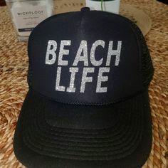 "Beach Life" Womens Trucker Hat. Adjustable, Snapback Black And Silver (New Without Tags) Adjustable Silver Beach Hat, Trendy Silver Summer Hat, Beach Hats With Letter Print In Black, Black Snapback Beach Hat, Black Snapback Hat For Beach, Black Letter Print Beach Hat, Black Snapback Trucker Hat For Beach, Black Baseball Cap For Beach, Black Trucker Hat With Letter Print For Beach