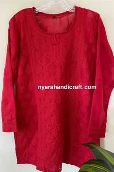 "Soft cotton Chikankari hand embroidered blouse. Matching liner Included. Length: 30 inches Color: Red \"Embroidery designs vary \"" Luxury Chikankari Embroidered Tops For Festive Season, Red Kurta With Floral Embroidery For Transitional Season, Red Floral Embroidered Kurta For Transitional Season, Red Floral Embroidery Kurta For Transitional Season, Embroidered Straight Kurta Top In Chanderi, Embroidered Chanderi Straight Kurta Top, Red Chikankari Embroidery Kurta For Transitional Season, Red Chikankari Embroidered Kurta For Transitional Season, Festive Chikankari Embroidered Top