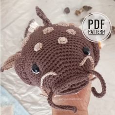 a crocheted elephant hat is shown with the words, free pattern on it