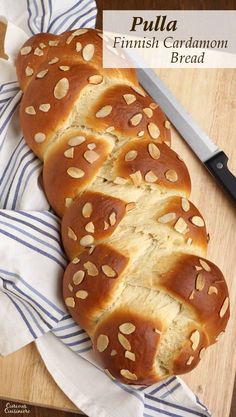 a loaf of bread sitting on top of a cutting board