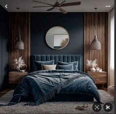 a bedroom with dark blue walls and white rugs on the floor, along with a round mirror above the bed