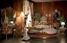 an ornately decorated bedroom is shown in gold and red tones with mirrors on the wall