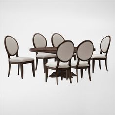 a set of six dining chairs and a table with upholstered backrests