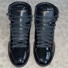 Saint Laurent Varnish Hi-Top Trainers. Brand New With Box, Shoe Dust Bags, Extra Laces And Certificate Of Authenticity. Size: Mens 45 Uk / 12 Us Color: Black/ Patent Leather Feel Free To Reach Out With Any Questions ! Luxury Black Patent Leather Sneakers, Designer Black Patent Leather Sneakers, Designer High-top Patent Leather Sneakers, Designer Patent Leather Sneakers With Round Toe, Luxury High-top Patent Leather Sneakers, Designer Patent Leather Sneakers For Formal Wear, Designer Patent Leather Sneakers For Formal Occasions, Designer Formal Patent Leather Sneakers, Luxury Patent Leather Sneakers With Leather Sole