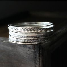 Sterling Silver Bangle Set of 12 - Big Stacking Set for the Silver Lover Braided Pattern, Hammered Bangles, Earthy Style, The Bangles, Metalwork Jewelry, Sterling Silver Bangle, Sterling Silver Bangles, Silver Bangle, Bangle Set