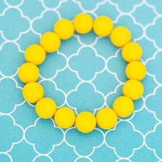 7 inch, Vintage Yellow Sphere Ball Beads Beaded Bracelet  GENERAL DESCRIPTION  Vintage Bracelet Color: Yellow Size:  7 inch Brand: NA Last photo includes measurements of bracelet. If you have any questions please feel free to message me! Yellow Bracelets With Colorful Round Beads, Bohemian Yellow Round Beads Bracelets, Vintage Yellow Beaded Jewelry, Vintage Yellow Round Bracelets, Vintage Yellow Jewelry With Polished Beads, Sphere Ball, Vintage Bracelet, Bracelet Vintage, Vintage Yellow