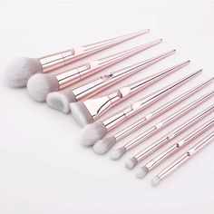 This 10 Pcs Makeup Brush Set contains high quality makeup brushes for all your needs.These synthetic brushes give your makeup a flawless finish with minimum effort.These brushes are suitable for use by both professional makeup artists as well as amateur makeup lovers.Each brush has soft, non-irritating nylon bristles and an ergonomic handle.From blush brushes to contouring brushes, you will find all you need in this diverse set! Features: Convenient display/stand keeps everything in order and wi Eyebrow Sculpting, Facial Makeup, Bronzer Brush, Pink Chrome, Makeup Brushes Set, Makeup Brush Set Professional, Cosmetic Brush, Highlighter Brush, Eye Makeup Brushes