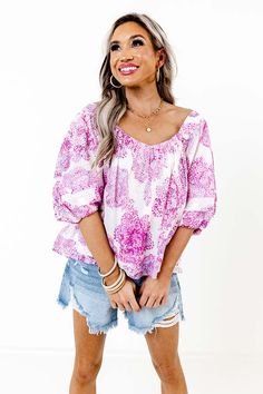 Slay the day in our adorable 'Moving To Malibu Top' featuring lightweight material patterned with a lavender and orchid hued spotted print, a scooped neckline, puff half sleeves, and a relaxed silhouette that falls into a straight hemline! 
                                      Measurements S :  Bust 36", Hip 40", Length 22", Sleeve Length 14", Waist 36".  M :  Bust 38", Hip 42", Length 22.5", Sleeve Length 14.5", Waist 38".  L :  Bust 40", Hip 44", Length 23", Sleeve Length 15", Waist 40". Slay The Day, Scooped Neckline, Model Fits, Women Clothing Boutique, Hip Length, Online Womens Clothing, Distressed Jeans, Half Sleeves, Boutique Clothing