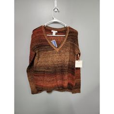 Christian Siriano New York X Small Oarnge Striped Long Sleeve Pullover Sweater. Casual Brown Knit V-neck Sweater, Casual Brown V-neck Sweater For Layering, Casual Orange Knit Sweater, Orange Knit Tops For Fall, Casual Brown V-neck Sweater For Spring, Orange V-neck Knit Sweater, Brown Long Sleeve V-neck Sweater For Spring, Trendy Orange V-neck Sweater, Orange V-neck Sweater For Fall