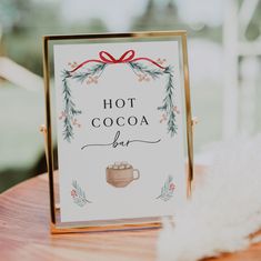 a sign that says hot cocoa bar on it