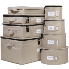 six canvas storage boxes with labels on them