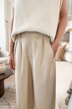 The Laney Tencel Tapered Pants in Natural are so lightweight and ready to be paired with your favorite summer blouse. Featuring pleated details, natural color, side and back pockets, tapered silhouette, half elastic waistband, zipper closure and a true to size fit. Style these amazing pants with a white tee or knit blouse! Details & Sizing Pleated details Natural color Side and back pockets Tapered silhouette Zipper Half elastic waist True to size fit Gabriella is wearing a size S Sizing S Waist Tapered Pants Outfit, Half Elastic Waistband, Tencel Pants, Blouse Details, Knit Blouse, Summer Blouse, Summer Blouses, Sock Shop, Tapered Pants