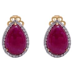 18K Yellow Gold Diamond Earrings Gross Weight : 4.140 Gold Weight: 2.616 Cts. Diamond Weight: 0.39 Cts. Ruby Weight: 7.23 Cts. Measurement: 15X10 mm Luxury Pear-shaped Diamond Earrings With Gemstones, Elegant Ruby Earrings Gia Certified, Yellow Gold Ruby Earrings With Diamond Accents, Formal Ruby Gemstone Diamond Earrings, Ruby Gemstone Diamond Earrings For Formal Occasions, Luxury Pear-shaped Gemstone Diamond Earrings, Formal Ruby Earrings In Yellow Gold, Formal Yellow Gold Ruby Earrings, Formal Ruby Yellow Gold Earrings