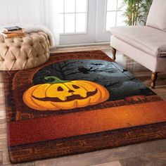 a halloween themed area rug with a jack o lantern on it