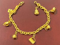 Vintage 24K 980 Pure Gold Rolo Charms Link Bracelet .... Marked 980...Total of weights 11.2grams...Measure of Bracelet 7'' W 4.8MM....It's in very good condition. Braided Bracelet Diy, Pink Jewelry, Pure Gold, Braided Bracelets, Chain Link Bracelet, Link Bracelets, Chain Link, Diy Bracelets, Arm Band