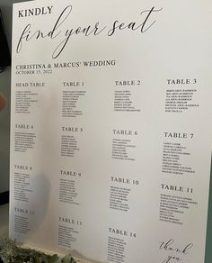 the seating plan for a wedding is displayed on a table