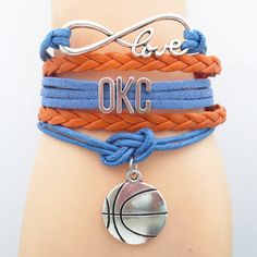 two bracelets with basketball charms on them and the words love ok get this free just pay shipping