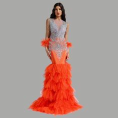 Dazzling Mermaid Gown with Crystal Embellishments and Ruffled Tulle Train Floor-length Ruffled Mermaid Dress For Gala, Glamorous Gown With Detachable Tulle Train, Tulle Mermaid Dress With Ruffles, Tulle Mermaid Hem Dress With Ruffles, Mermaid Hem Tulle Wedding Gown, Tulle Mermaid Hem Wedding Gown, Tulle Floor-length Mermaid Dress For Prom, Floor-length Tulle Mermaid Dress For Prom, Wedding Tulle Gown With Mermaid Hem