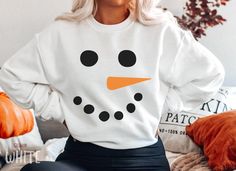 Funny Christmas Snowman Sweatshirt, Cute Family Matching Snowman Face Sweater For Women, Retro Vintage Xmas Holiday Party Crewneck Sweater HOW TO ORDER ➀ Select color ➁ Select the size (Please check size chart) ✦ True to size. Size up 1-2 sizes for an oversized look. ➂ Add to cart ✦ (Optional) "Add message to Seller" on the checkout page. GARMENT FEATURES ✦ Crew neckline ✦ Direct to garment printing - no vinyl, decal, or iron-on technique ✦ Our designs are printed on the garment to last a long time and may not appear as 'glossy' or saturated as iron-on designs are. ✦ Please note that colors may appear different on different digital screens and may not be a true representation of the actual colors. ✦ Additional T-Shirt Colors and Sizes Available Upon Request ✧✧Brands: Bella Canvas Unisex 30 Fun Winter T-shirt With Crew Neck, Fun White Sweatshirt For Winter, Fun Winter Crew Neck T-shirt, Fun Crew Neck T-shirt For Winter, Fun Crew Neck Winter Tops, Fun Crew Neck Tops For Winter, White Crew Neck Winter T-shirt, White Crew Neck T-shirt For Winter, Fun Crew Neck Winter Sweatshirt