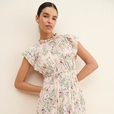 Pleated Fit And Flare Dress For Garden Party, Chic Spring Dress With Flutter Sleeves, Chic Floral Print Dress With Flutter Sleeves, Feminine Short Sleeve Lined Midi Dress, Feminine Pleated Dress For Casual Occasions, Feminine Casual Lined Midi Dress, Feminine Flutter Sleeve Midi Dress For Garden Party, Spring Daywear Dress With Flutter Sleeves, Spring Flutter Sleeve Dresses For Daywear