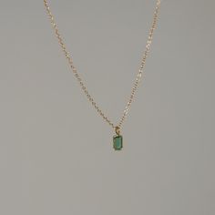 Such a delicate stunner! Emerald is the gemstone of intuition💚 Emerald pendant measures 5x3mm, and wrapped in solid 18k gold Necklace length measures 17" long, solid 14k gold Solid 14k yellow gold with genuine emerald Dainty 14k Gold Emerald Necklace, Dainty Yellow Gold Emerald Necklace, Minimalist 14k Yellow Gold Emerald Necklace, Minimalist Yellow Gold Emerald Necklace, Dainty Emerald Necklace In 14k Yellow Gold, Minimalist 14k Gold Emerald Gemstone Necklace, Minimalist 14k Gold Emerald Necklace, Everyday Yellow Gold Emerald Necklace For May Birthstone, Dainty Emerald Necklace