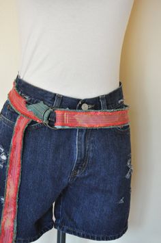 This is a new item I have added to DavidsonStudio.    My denim craze continues.. I have denim garment remnants that I just can't throw away.. I must continue to create.    I have plans for several belts in various sizes and color combinations.  Each belt is unique and one of a kind!  Enjoy!! Here is a statement belt to brighten up any outfit!  Show your creative artistic side with this sustainable denim accessory.  This unique belt would make a stunning pop of color to your ensemble!   This item D Ring Belt, Denim Belt, Jean Belts, Denim Accessories, Upcycle Jeans, Recycled Denim, Suspender Belt, Suspenders, Stunning Dresses