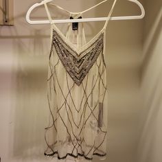 Forever 21 Sheer Champagne Beaded Camisole. Sheer Champagne Colored Tank Top Has Metallic Beadwork At Front And Hem. **Imo - Beautiful To Wear Layered Over A Camisole Or As An Elegant Swim Coverup. Size Small Can Also Fit Medium. New With Tags Glamorous Summer Tops With Beaded Straps, Embellished Summer Party Tops, Chic Summer Tops With Beaded Straps, Beaded Tops For Night Out In Summer, Beaded Tops For Summer Night Out, Short Sleeve Peplum Top, White Lace Tank Top, Ruffle Long Sleeve Blouse, Tuscan Villa