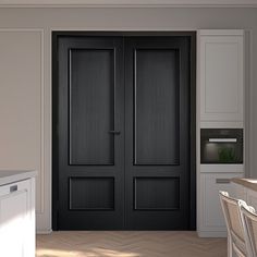 two black doors are open in the kitchen