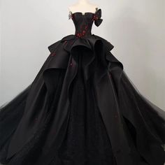 Regal Gothic Black Wedding Dress Ball Gown with Off-Shoulder Black and Red Floral Accents Plus Size - WonderlandByLilian Pretty Black Wedding Dress, Ball Gowns Vampire, A Black Wedding Dress, Red And Black Wedding Dress The Bride Gowns, Black And Burgundy Quince Dress, Black And Red Gown Elegant, Black And White Wedding Dress Corset Victorian Ball Gowns, Unique Black Wedding Dresses, Black Wedding Dress Gothic Lace Gowns