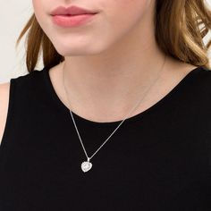 Vibrantly shine with this gorgeous fashion pendant. Fashioned in sterling silver, this vivid look showcases a 7.0mm heart-shaped lab-created shimmering white sapphire centered in a shadow-style heart-shaped frame of additional created sapphires. Buffed to a brilliant luster, this pendant suspends along an 18.0-inch rope chain that secures with a spring-ring clasp. Vvs Clarity Cubic Zirconia Heart Necklace, Shadow Frame, Heart Shaped Frame, Fashion Pendant, Sapphire Stone, Stone Heart, White Sapphire, Rope Chain, White Metal