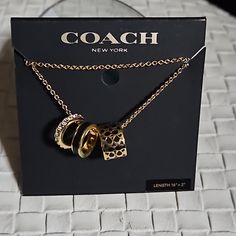 Coach Lecklace, Gold With Back And Diamonds. New With Tag. Coach Jewelry Necklace, Chic Coach Jewelry As Gift, Chic Coach Jewelry As A Gift, Coach Adjustable Jewelry For Party, Elegant Coach Jewelry With Adjustable Chain, Adjustable Coach Jewelry For Party, Black And Gold Jewelry, Coach Necklace, October Jewelry