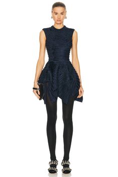 Find ALAÏA Ribbed Dress In Navy on Editorialist. ALAÏA Ribbed Dress in Navy Self 1: 79% viscose 16% polyester 5% polyamide Self 2: 75% viscose 25% polyester. Made in Italy. Dry clean only. Unlined. Pull-on styling. Rib knit fabric with velvet trims. Asymmetric hem. ALIA-WD137. AA9R23724M810. About the designer: The late Azzedine Alaïa had a comprehensive understanding of the female form, thanks to an education in sculpture from École des Beaux-Arts. Revered for his bodycon silhouettes that defined the aesthetic of Paris in the ‘80s, the Tunisian designer was also known for his intricate footwear, statement bags and laser-cut accessories. Alaia Dress, Virtual Outfits, Statement Bags, Azzedine Alaïa, Rib Knit Fabric, Azzedine Alaia, Ribbed Dress, Velvet Trim, Ribbed Dresses