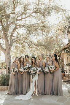 a group of women standing next to each other