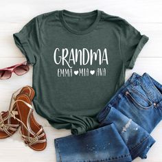 "Personalized Grandma Gift, Grandma Shirt With Grandkids Names, Custom Granny Shirt with Grandkids Names, Custom Grandma Shirt, Granny Shirt, Personalized Grandma,Grandma Shirt,With Grandkids Names,Custom Granny Shirt,Grandkids Names Tee,Custom Grandma Shirt,Granny Shirt,Mothers Day Gift,nana shirt,Cute Grandma Shirt,grandma grandkids,grandkids shirt,nana grandkids name  Hello! Welcome to my store, I'm delighted to see you here. My store's main goal is to make you happy. I see you as a friend, n Cute Green Tops With Name Print, Green Short Sleeve Tops For Mother's Day, Green Casual Shirt With Name Print, Casual Green Shirt With Name Print, Green Tops With Name Print For Summer, Green Short Sleeve Tops With Name Print, Green Short Sleeve Top With Name Print, Green Summer Tops With Name Print, Granny Shirts