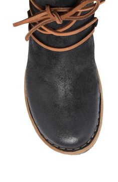 This rugged chukka boot raised on a subtle wedge is outfitted with cushioned support and a flexible sole to keep you totally comfortably. Leather upper/textile lining/rubber sole Imported