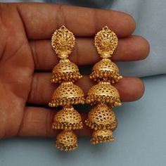 Discover the allure of Handmade Gold Jewelry at https://morvijewels.etsy.com/   Get a dazzling 25% off on all our 22k and 18k gold pieces. Don't miss out on this limited-time offer. Shop now and embrace the radiance of gold! Beautiful 22 Karat Gold Handmade Earrings jhumki Traditional Design jewelry Gold Purity- 22k yellow Gold Length - 7.5 cm Width - 2 cm max Weight - 30.190 grams approx The earrings comes with normal push/backs If you want real gold push please let us know. Thank You Click to Temple Jewelry Tilla Jhumkas, Temple Style Dangle Jhumkas, Chandbali Jhumkas For Wedding And Navratri, Wedding Chandbali Jhumkas For Navratri, Bollywood Style Wedding Jhumkas With Intricate Design, Wedding Navratri Danglers With Intricate Design, Bollywood Style Intricate Design Jhumkas For Wedding, Bollywood Style Intricate Design Wedding Jhumkas, Gold Danglers For Wedding And Navratri