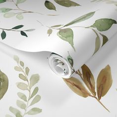 a white wallpaper with green leaves on it