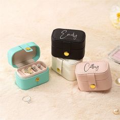 Protect your precious jewels with a personal touch.  Designed for travel or gifting, our mini jewelry box is not just a container but a cherished keepsake. Whether for a loved one or bridesmaid, it’s an elegant way to show your gratitude and celebrate the meaningful connections you hold dear.  This dainty box, cloaked in luxurious PU leather and lined with velvet, ensures your jewelry stays free from dust, abrasions, and scratches. It features five secure slot rolls, providing a sanctuary for ri Stud Earring Storage, Mini Ring, Earring Jewelry Box, Ring Storage, Earring Storage, Leather Jewelry Box, Simple Leather, Earring Organizer, Leather Ring