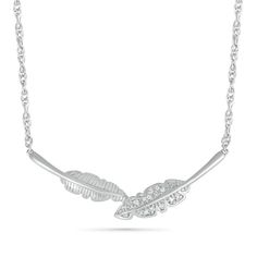 With a romantic feel, this necklace is the perfect accessory for your style. Crafted in sterling silver, this choice showcases a pair of sculpted feather-shaped leaves - one polished with vein-like detailing, another touched with shimmering diamond accents. Buffed to a brilliant luster, this design suspends centered along a 16.0-inch rope chain with 2.0-inch extender that secures with a spring-ring clasp. Elegant Sterling Silver Leaf-shaped Necklace, Elegant Sterling Silver Feather Jewelry, Silver Sterling Silver Necklaces With Feathers, Silver Feathered Sterling Silver Necklaces, Silver Leaf-shaped Necklace, Peoples Jewellers, Leaf Necklace, Rope Chain, A Romantic